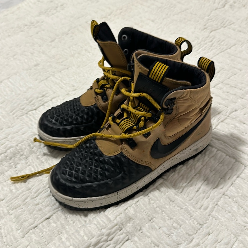 Nike boots. US size 5. Youth